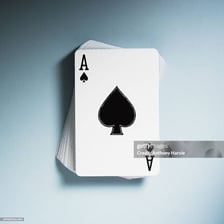 A close-up view of an ace playing card.