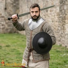 A medieval shield representing the armour piece in the wordplay.