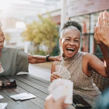 A group of people laughing together.