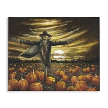 A scarecrow standing in a cultivated field