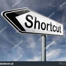 A road sign indicating a shorter alternative route