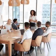 Employees meeting in a modern company office.