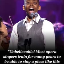 A young treble singing with a choir.
