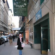 A street scene suggesting a nearby location just around a corner.