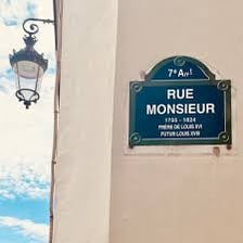 A Paris street scene with a French address context.