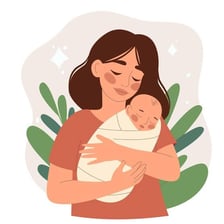 A parent holding a newborn infant.