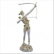 A statue or artwork depicting Artemis with a bow