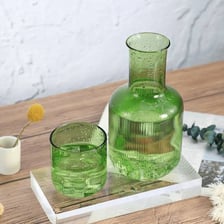 A glass carafe filled with water on a table