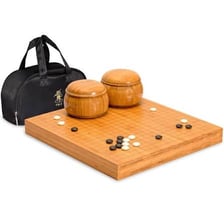 A Go board with black and white stones.