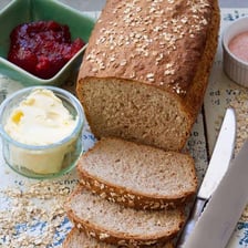 A sliced loaf of wholemeal bread