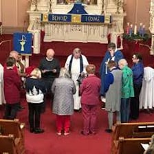 A church deacon assisting during a service