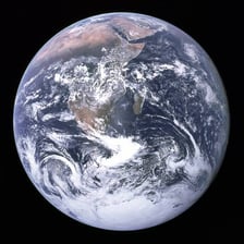 Earth shown as a planet against the blackness of space