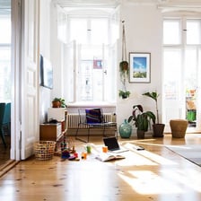 Members of a household together in a living room