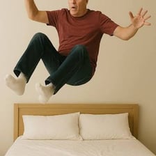 A person asleep in bed