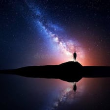 A person in a dark nighttime setting