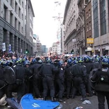 Police forming a containment line around protesters at a demonstration