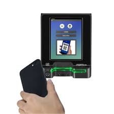 A payment card reader mounted inside a vehicle