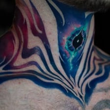 Tattoo artwork visible on human skin