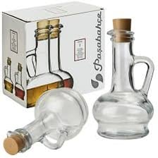 A glass bottle with its stopper held upright