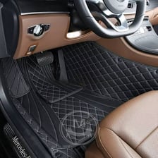 A carpeted floor area inside a vehicle