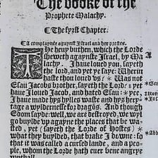 A Bible opened to the Book of Malachi.