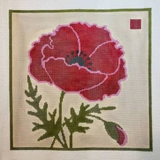 Close-up of needlepoint embroidery worked on canvas