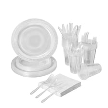 A set of plastic plates, cups and cutlery.