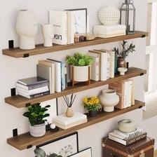 Wooden shelves supporting rows of books