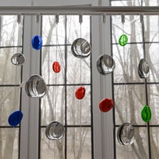 An object held up by a cable and suspended above the ground.