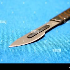 A surgical scalpel shown in close-up.