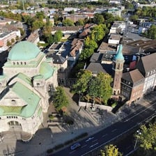 A city view of Essen, Germany, including a church.