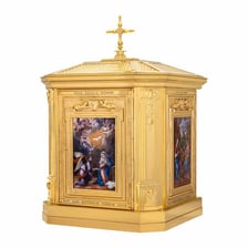 An ornate gold tabernacle in a church.