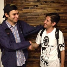 Two people shaking hands as a sign of friendship.