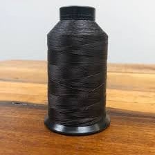 A close-up of nylon textile thread and fabric