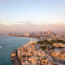 Tel Aviv’s modern skyline beside the Mediterranean coast