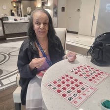 A bingo player celebrating a winning call