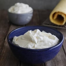 A bowl containing thick dairy cream
