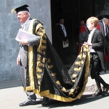 A historical court attendant in period clothing