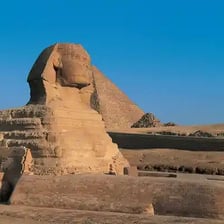 An ancient Egyptian pyramid viewed from the desert