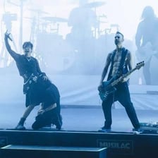 The rock band Placebo performing on stage.