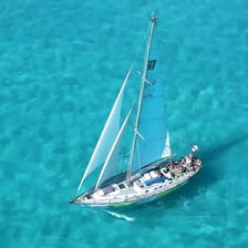 A small boat sailing on the sea