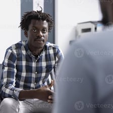 A calm patient waiting in a hospital setting.
