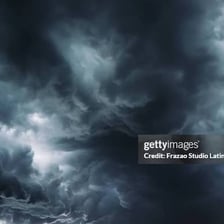 Dark storm clouds suggesting an ominous sign.