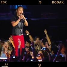 Journey performing the song “Open Arms” onstage