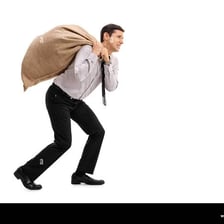 A person carrying a large bag.