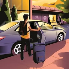 An Uber rideshare car picking up a passenger.