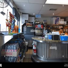 The modest interior of a small hole-in-the-wall restaurant.