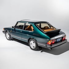 A classic Saab 900 automobile, a recognizable Swedish car model.