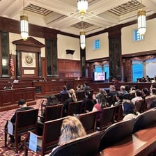 A staged courtroom scene representing a mock trial