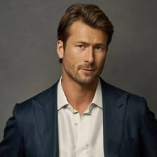 A portrait of actor Glen Powell.
